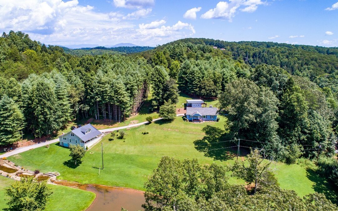97 Acre Homestead with Big River Frontage